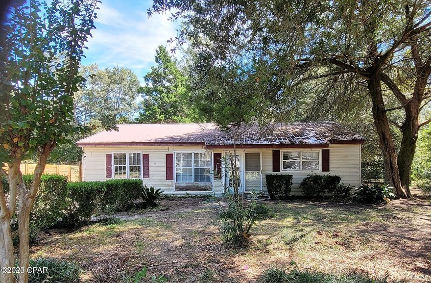 Looking for a CASH BUYER for this 4-bedroom, 1-1/2 bath home near everything DeFuniak Springs has to offer.  Located on a paved road just off Highway 331N.  The home needs updates and some repairs to bring it back to it's full potential.  Has a metal roof and a large back yard with partial fencing.  This fixer-upper is a great investment for the right buyer. Home is being sold AS IS. Buyer to verify all pertinent information.