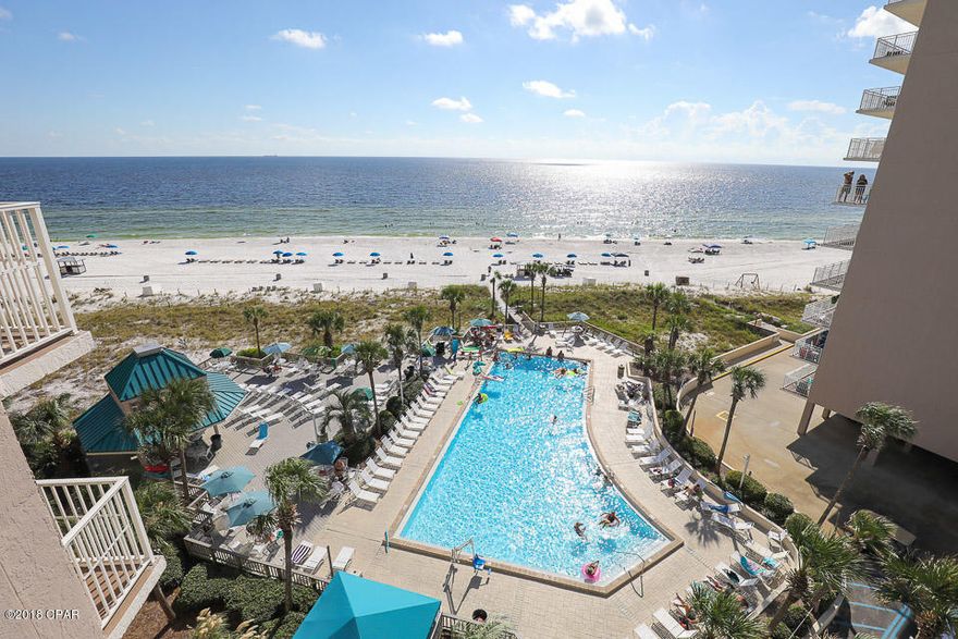 Everyone of these three bedrooms has a wonderful Gulf view. This roomy condo has a large balcony that over looks the pool. The living room and dining room are open and inviting with excellent gulf views from both.  New living room furniture sets the tone and the kitchen has new cabinets and flooring.. This complex offers it all with several pools, tennis, and out door facilities. It is gated and there are two undercover garage spaces with a storage locker that are all gated and secure. The 2 secure parking spaces  is extremely rare. This condo is netting over $42,000 yearly with strong history of rentals by the owner. Dunes of Panama is a highly thought about older complex that has consistently been a value through the years to both buyers and renters.