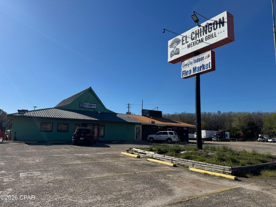 Location is KEY , this large commercial  property is less than a mile from the I10 exit in Bonifay Fl. At the present time this property has 3 active business's (tenant's). A Restaurant, Liquor Store and Smoke Shop. The building is for sale NOT the individual business's. This property has a positive income stream and so much potential for future use. Holmes county is growing and has a lot of new growth coming . Great opportunity for the investor. Call to find out more information.