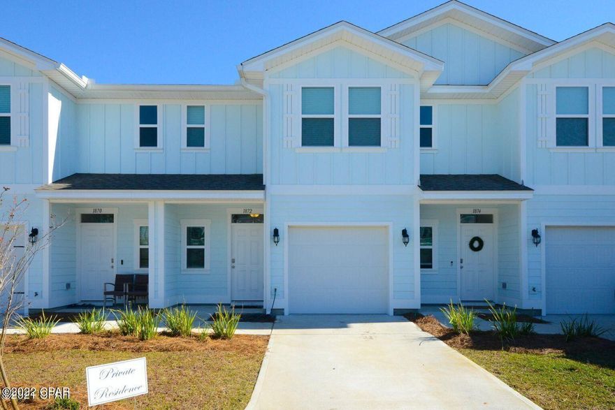 CURRENTLY UNDER CONTRACT - SELLER ACCEPTING BACK UP OFFERS. Located in this newer subdivision right next to the Panama City Beach sports complex, this 3 bedroom 2.5 bath with an oversized single car garage with all the upgrades already in place. This is one of the premier lots in Hathaway townhomes located near the end of a quiet cul-du-sac. Less than a 5 minute drive to Navy Base & only 10 minutes to the Beach. This new neighborhood with a community pool also allows weekly and long term rentals, for those who want to use this as second home or investment property, it is an ideal situation because of ongoing tournaments that are happening in the Sports Complex. This unit has been upgraded, compared to some others on the market that are mostly original