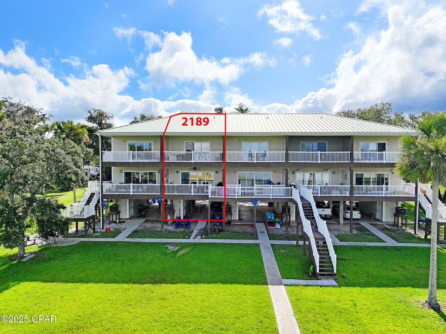 Welcome to BAY FRONT living at its finest! This beautiful 3 bed, 3.5 bath townhouse offers a light-filled living space with breathtaking views over the St. Joseph Bay. Just a short scenic drive from Historic Port St. Joe, this property sits directly on the bay—prime for fishing, boating, scalloping, wildlife watching, and serene sunsets. Open living areas with a mix of tile and LVP, central heat/AC, and a full suite of appliances. Two levels of decks offer sweeping water views, with native cabbage palms and live oaks creating privacy, and shared bayfront access via private grounds. Steps from Presnell's Marina, with easy boat launch access—perfect for anglers and boating enthusiasts.  You will witness the most extraordinary sunsets on the coast from this amazing home!  Owner occupied but can be used for short term rental purposes.  Call today for your opportunity to view in person or video chat.