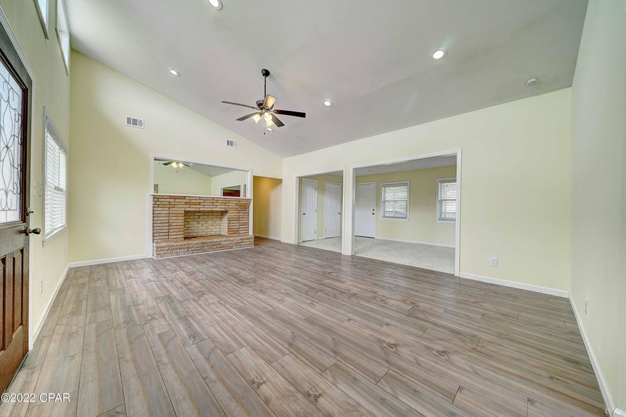 CURRENTLY UNDER CONTRACT, SELLER WILL CONSIDER BACKUP OFFERS Beautifully remodeled and completely rehabilitated 3 bed, 2 bath home on a large corner lot near TAFB! This home features many updates such a new roof, new windows, new kitchen, recessed lighting, LVP flooring, oversized tile flooring and more! The living room boasts vaulted ceilings with recessed lighting, a faux fireplace and large windows to allow plenty of natural lighting to illuminate the space. The eat in kitchen features two dining spaces, recessed lighting, new appliances, new cabinets and white subway tile backsplash. The primary bedroom is spacious with a large closet and a private en suite. The primary bathroom features a large walk-in surround tile shower and a new vanity. The two additional bedrooms feature LVP flooring and share a full guest bathroom. The guest bathroom features a surround tile shower/tub combo and a new vanity as well. There are two large hallway closets for inside storage. This home boasts a large covered back deck that is perfect for enjoying the Florida sunshine with family and friends. The deck also features a ramp that is handicap accessible. There is a shed for additional storage. This home also features a covered driveway and a large front porch. Located near TAFB, schools, restaurants, shopping, parks including parks with public boat ramps, a sports complex and an arts and conference center. Check out this home today!