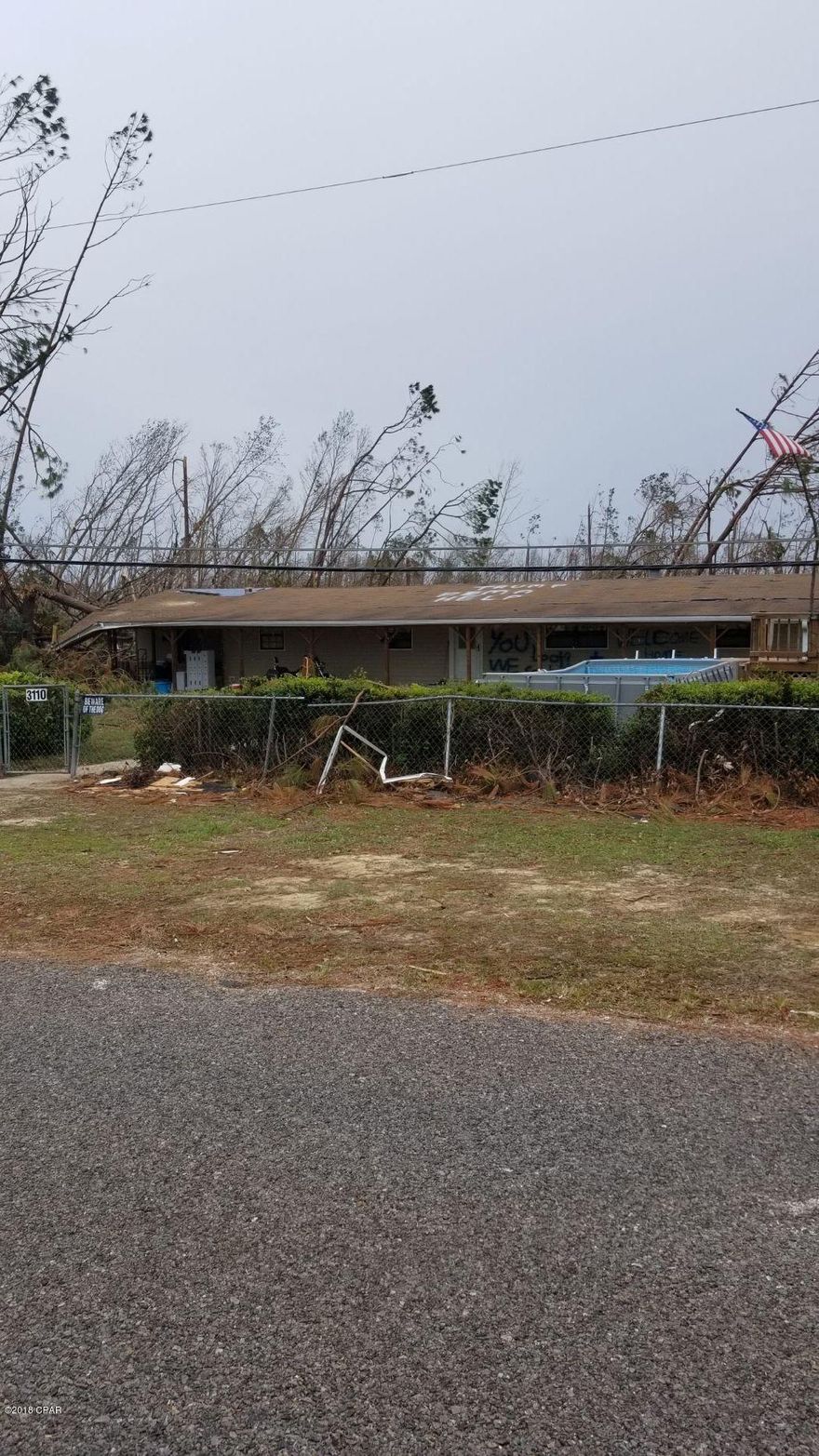 Great 4/3 open floor plan on a huge corner lot. Over 3/4 of an acre, and close to everything. 25 minutes from Panama City Beach and only 6 minutes from shopping. With a full length, covered front patio. Beautiful, spacious and fenced in lawn ,front and back.

- new septic pump installed

- new well pump

- appliances less than 3 years old

- all appliances convey including washer and dryer 

- new flooring

- 20x20 air conditioned shed 

- alarm system

- security cameras are negotiable

Click on MORE for HURRICANE MICHAEL UPDATE! HURRICANE MICHAEL UPDATE:  Sellers have removed all the appliances and the cameras and security system.  Operating condition of the septic tank, well or the sheds is unknown at this time.  Value is in the land; contact us to find out how to get a renovation loan to make this uninhabitable/storm ravaged home your dream home on lot over 3/4 acres.