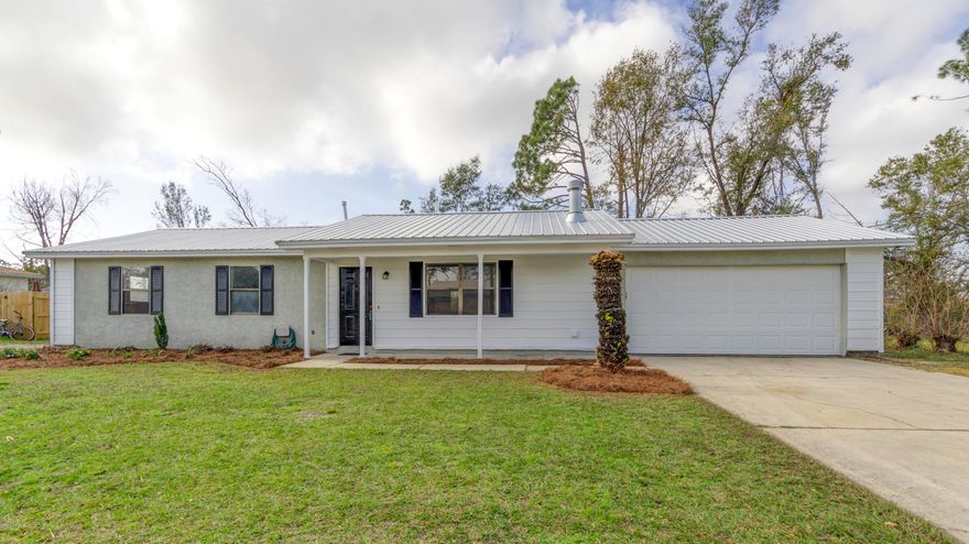 Move in ready! Centrally located in Venetian Villa, Panama City, Fl. Large house boasts an open floor plan with 3 bedrooms, 2 baths, family/game/office room with built in bookcases and a fenced in back yard. Breakfast bar open to the kitchen and living space. Located on a quiet cul de sac. Brick fireplace nestled in the living room corner and plenty of storage throughout the home. Metal Roof, New Paint, Newer appliances, Fenced Back Yard, New Landscaping & a Garage large enough for a vehicle and plenty of storage. Located in an area away from businesses and still in town. Not far from Bay Haven Charter Academy, Mowat Middle School, and Mosley High School. 15 minutes from Gulf Coast State College.