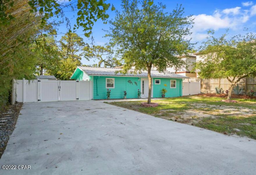 Don't miss your chance to own this very affordable and updated beach home on a large lot with plenty of room in the back yard to add a swimming pool. For you investors, it would make a perfect beach get-a-way for short term rentals or long term rentals with NO HOA FEES! This charming house is located one mile away from the sugary white sands of the beautiful Gulf of Mexico and geographically poised to ensure convenient enjoyment of world class dining and many other great beach entertainment options! And guess what?! Seller will pay up to $5000 of Buyers closing costs with a full price offer! Cash Only!