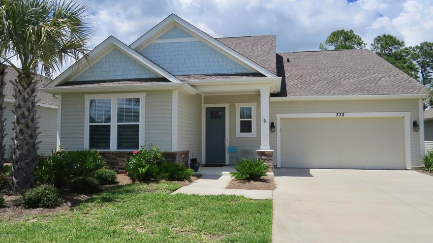 CURRENTLY UNDER CONTRACT, SELLER ACCEPTING BACKUP OFFRS...Wooded and Private Conservation View.  4 Bedrooms and 3 Baths less than a mile from the Beach.  Whisper Dunes has a wonderful pool and pavilion area for residents and the added benefit of not worrying about your lawn care.  The HOA will maintain the lawn!  Perfect for the 2nd home at the beach.  Or, if you work from home you can use the bedroom upstairs with it's own bath.  The main bedroom is on the first floor along with the open kitchen, dining, 2 other bedrooms and family room.  Enjoy the view from the covered patio.  This like new home has many upgrades.  Put it on your list to schedule your appointment.  You will love the quiet West End of Panama City Beach!