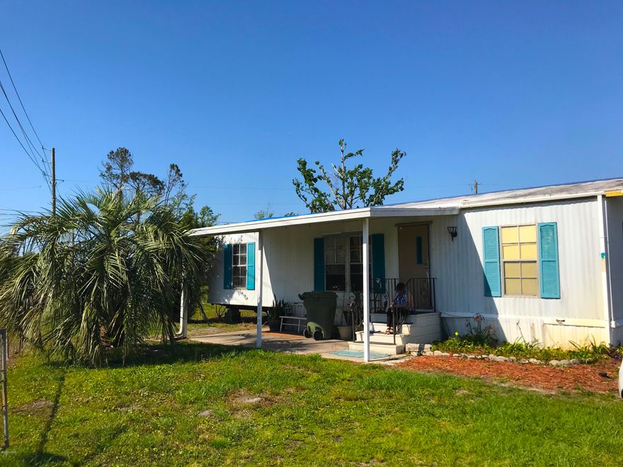 This property would make a great investment property with a few repairs, or just a great fix & flip! Centrally located in south Lynn Haven, this home is in a great area with lots of shopping, amenities, etc. all close by. It's a 2 Bedroom / 1 Bath modular home with 960 sq. ft. (heated) and 1,120 sq. ft. total. It does have some damage from Hurricane Michael, and will need some work on the roof and floors; but not much. It has septic and also a well on the property. Don't wait - It definitely won't last long at this price!     ----- CASH BUYERS ONLY -----