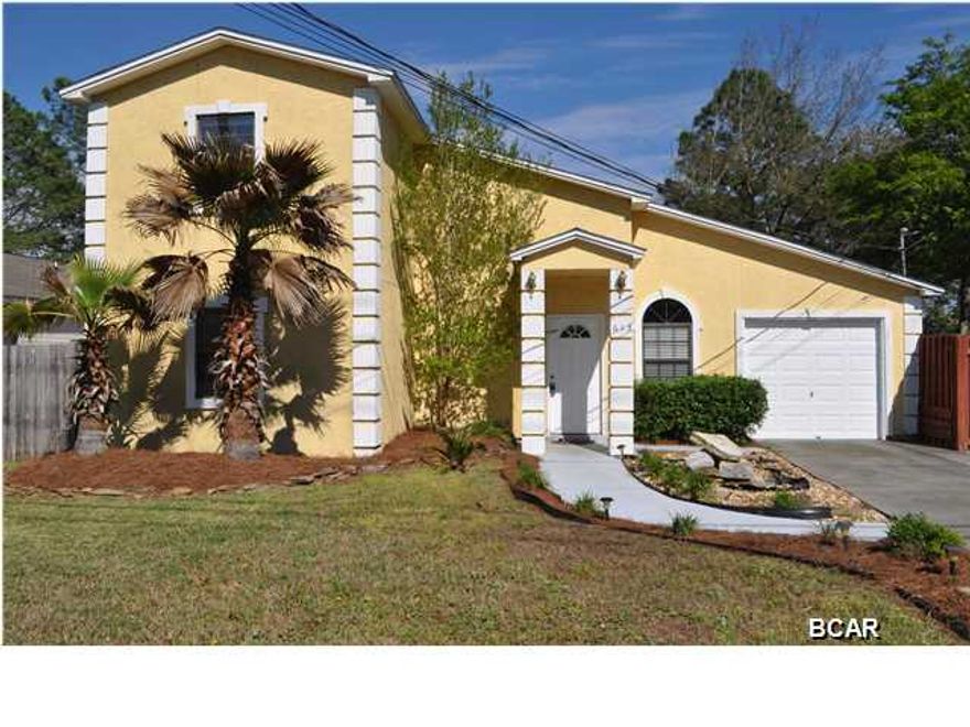 Well-maintained and spacious home close to Tyndall AFB, schools, shopping and more! This home was updated in the last few years and is very contemporary with a split-bedroom floor plan. The kitchen features stainless steel appliances that all convey, a breakfast bar for on-the-go snacks and a dining room where the whole family can enjoy dinnertime together. The cozy fireplace in the living room will warm you up fast during the colder months. The Master Suite is located on the first floor, while the two additional bedrooms are nestled on the second level. The backyard is quite large and privacy fenced, and if you like to grill out and/or entertain, you'll love the back deck. This is a great family home at a terrific price! All info is approx. and must be verified by Buyers if important.