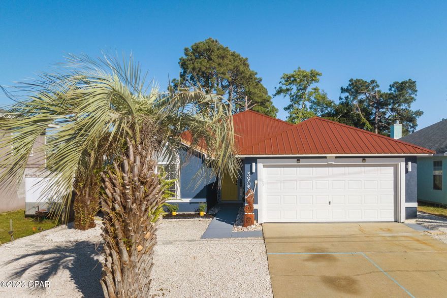 CURRENTLY UNDER CONTRACT, SELLER WILL CONSIDER BACKUP OFFERS. Rent one and live in the other! Check out this 4 BR / 2 BA home that sleeps 11 on the east end in South Grand Lagoon with a detached studio already a high producing AirBnb that sleeps 4.  The single level split floor plan is great for families as a primary, second home or short-term rental. Homes convey fully furnished. Recently updated in 2021 with new exterior/interior paint, appliances, fixtures, and a studio remodel with new appliances and A/C. A solar system was installed in 2022 reducing the electric bill all year long. If you are looking for a fully furnished multi-family income producing property in a great location – then look no further!