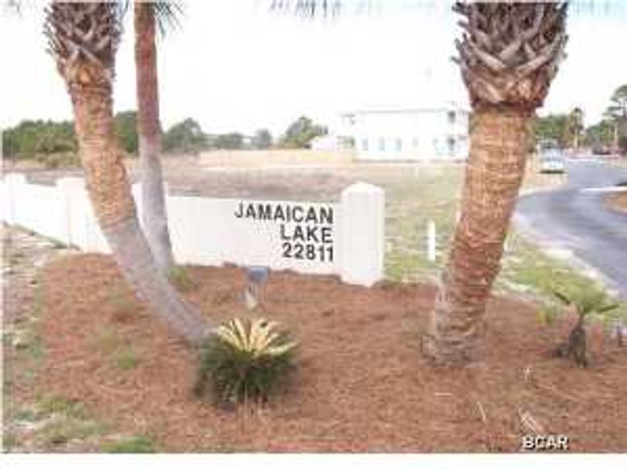 FORECLOSURE SALE ... corner lot ... no doubt one of the larger lots in Jamaican Lake. Just inside entry to subdivision. Cleared and level. No one can build between this lot and Front Beach Road. Gulf-views attainable with two-story home. This lot is ideally located close to shopping, eateries, beach and the Carillon Beach Community. Letter of credit approval required or, proof of funds if cash purchase. Seller disclosures are not available as this property is a foreclosure. Buyer to verify lot size.