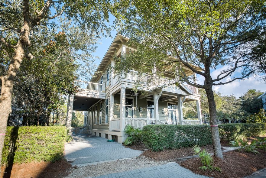 AMAZING LOCATION! Centrally located on Viridian Park with incredibly easy access to Seaside, Western Lake, walking and bike trails, Camp Watercolor, the Boathouse, Watercolor Beach Club and the rest of the Watercolor amenities. This custom home features 4 bedrooms, 4 bathrooms, 3 seating areas with a 3-story fireplace in the main living room, spacious dining room, large kitchen with over-sized island.  Viking appliances, plenty of windows and natural light, hardwood floors throughout, brand new TVs throughout, tastefully decorated and fully furnished with top of the line furnishings and more! The Brand new outdoor living area features a 10'x 10' hot tub overflowing into a 10'x18' heated pool, summer kitchen, outdoor fireplace and over 1900 sq. ft. of outdoor deck space to gather and enjoy!