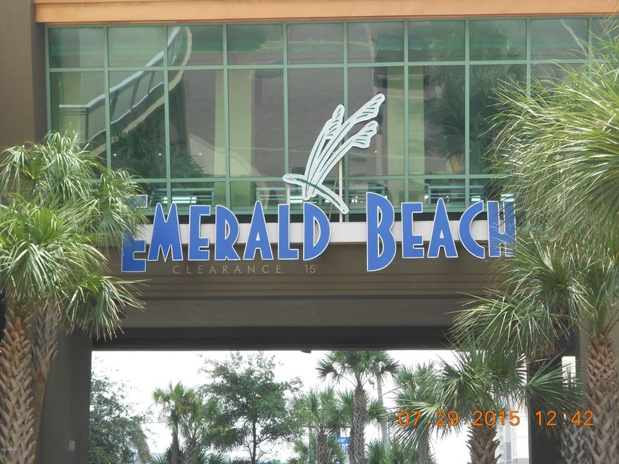 GREAT PRICE, AWESOME LOCATION; EMERALD BEACH RESORT UNIT 2328! Professionally decorated larger 1 bedroom condominium unit with bunk area and sofa sleeper to accommodate 6 people. This exceptional condominium unit is being sold ''As Is'' and fully furnished. Both bunk beds have their own flat screen TV/DVD units. This unit comes with ceiling to floor sliders that run the full length of the living room with tile throughout the unit. Amazing kitchen with granite countertops and stainless steel appliances. Additional features include decorative ceiling fans, crown molding, beach life vibrant colors and a balcony overlooking the beautiful Gulf of Mexico. Amenities include 4 pools (including a kiddie pool), hot tubs, exercise/weight room and a STARBUCKS!