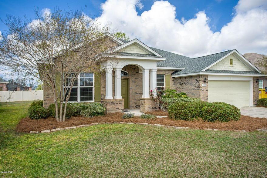 New improved price!!   Now is your chance to live in desirable Hawks Landing which is located conveniently to schools, shopping and restaurants.  This custom house has a grand entrance with large columns and as you walk into the main living of the house it has such an open feel featuring 10 ft ceilings, the upscale kitchen complete with stainless steel appliances, custom cabinets, granite countertops complete with a large island over looking the great room.  As  you gaze though the glass doors and windows you will see the oversided porch perfect for entertaining family and friends.  New laminite flooring and roof.  Hawks Landing has a reclaimed water system for watering the lawn.  Excellent floor plan for  your family.  Call today for your private tour.