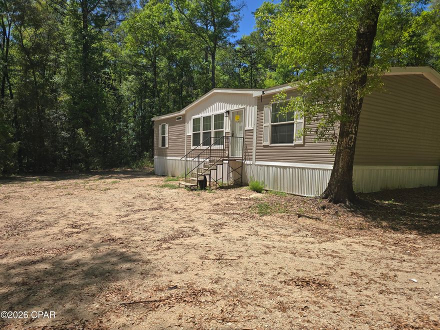 Beautiful 3 Bedroom 2 Bath Home in Central Walton County! This home sits on a gorges 3.33+/- Acre lot that is littered with beautiful Oak Trees, and offers plenty of space between neighbors. 

Inside the home, is a split floorplan style. The main living area offers a large living room, kitchen with pantry and center island, and a well sized dining area. The master suite boasts a large bedroom with a big walk-in closet, and a master bathroom featuring a double vanity, soaking tub, and large walk-in shower. On the opposite end of the home, you will find the 2 guest rooms and accompanying guest bath. 

This home is priced very aggressively for this area, so hop on this one fast! Schedule your showing today!