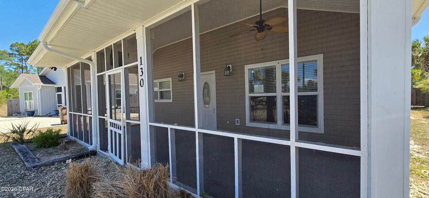 **Multiple Offers Exists, All Highest and Best Offers Due by  04/16/2026 01:00 PM CST** 
Welcome to your next favorite beach getaway! This charming 3-bedroom, 2-bathroom coastal cottage is sitting pretty in the Highlands at St. Joe Beach, and it's ready to steal your heart.

Inside you'll find 1,200 square feet of laid-back living with an open concept layout that just feels right. The vaulted ceiling in the living room gives everything an airy, breezy vibe, while the primary bedroom features a gorgeous coffered ceiling that adds a touch of elegance. Wood laminate flooring flows throughout the home, and the bathrooms are decked out with modern tile and updated fixtures. The kitchen comes equipped with stainless steel appliances, making meal prep a breeze after a long day soaking up the sun.

Speaking of sun, you're less than half a mile from the beach. Grab your golf cart because this community is totally golf cart friendly. Windmark Public Beach access is just a short distance away, so sandy toes are practically guaranteed.

Outside, you'll love the screened front porch for sipping morning coffee, a privacy-fenced backyard for hanging out, and a detached storage building for all your beach toys and gear. The home connects to city water and sewage, and here's the cherry on top -- no homeowners association fees to worry about.

Painted in beautiful coastal colors and perfectly positioned in one of Florida's most relaxed beach communities, this cottage is calling your name. Don't let someone else answer first -- schedule your showing today!