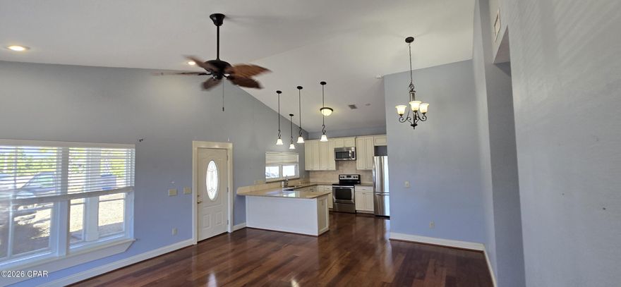 **Multiple Offers Exists, All Highest and Best Offers Due by  04/16/2026 01:00 PM CST** 
Welcome to your next favorite beach getaway! This charming 3-bedroom, 2-bathroom coastal cottage is sitting pretty in the Highlands at St. Joe Beach, and it's ready to steal your heart.

Inside you'll find 1,200 square feet of laid-back living with an open concept layout that just feels right. The vaulted ceiling in the living room gives everything an airy, breezy vibe, while the primary bedroom features a gorgeous coffered ceiling that adds a touch of elegance. Wood laminate flooring flows throughout the home, and the bathrooms are decked out with modern tile and updated fixtures. The kitchen comes equipped with stainless steel appliances, making meal prep a breeze after a long day soaking up the sun.

Speaking of sun, you're less than half a mile from the beach. Grab your golf cart because this community is totally golf cart friendly. Windmark Public Beach access is just a short distance away, so sandy toes are practically guaranteed.

Outside, you'll love the screened front porch for sipping morning coffee, a privacy-fenced backyard for hanging out, and a detached storage building for all your beach toys and gear. The home connects to city water and sewage, and here's the cherry on top -- no homeowners association fees to worry about.

Painted in beautiful coastal colors and perfectly positioned in one of Florida's most relaxed beach communities, this cottage is calling your name. Don't let someone else answer first -- schedule your showing today!