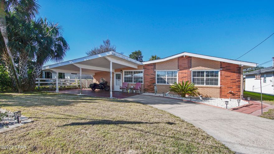 UNDER CONTRACT - ACCEPTING BACKUP OFFERS. This beautiful 2 bedroom with bonus room, 2 bathroom, brick home that is clean and ready to move into with close proximity to the beach and Pier Park is now available for sale! This home features a large kitchen, with breakfast nook. and ample cabinetry. There is a formal dining room adjoining the kitchen and an extra room that could possibly be converted to another bedroom. The family room has a wood burning fireplace and the living room has built in shelves on the wall. The property has a large back yard with storage, and is three blocks to the beach. The effective age of this home is 1991 and is well maintained. Don't miss out on your opportunity to buy a home so close to the world's most beautiful beach!