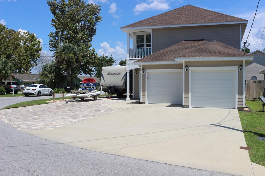 OPTION TO BUY FULLY FURNISHED WITH SWIM SPA! This beautiful home is just like new in the Open Sands neighborhood. Open Sands is a golf cart friendly and about as close to the beach as you can get. This amazing home comes with over sized parking big enough for campers, boats, or anything else you can think of. Other unique features included are an over sized two car garage, energy efficient windows, open floor concept, and brand new pavers all around the home. It also has Granite countertops and tiles floors in all the bathrooms and kitchen. Make an appointment today to see your new dream home!