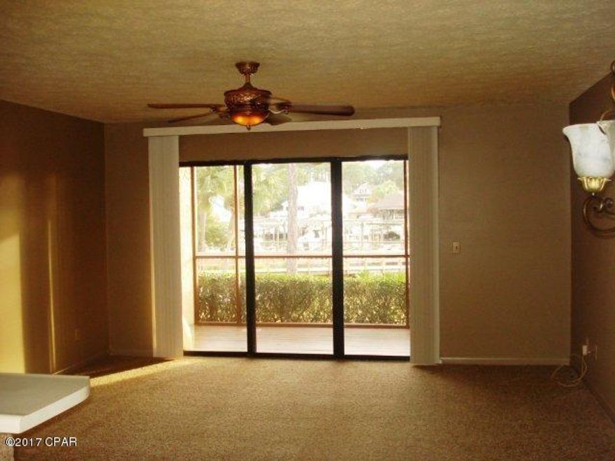 Condo has 1 bedroom,master bath with double sinks and 1/2 bath for guest. The patio is fully enclosed with a nice view of the lagoon. The pool is located just across from the front of the condo and there is a gazebo and dock in the back of the unit. This is a must see condo!