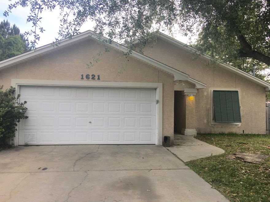 WHAT A DEAL! A stucco 3BR 2BA, nestled in a quiet neighborhood away from all the hustle and bustle. Large living area, very open concept with high ceilings....extremely rare at this price point. A short drive from the beach, easy highway access, and close to churches, shopping and restaurants. This property is in the coveted Breakfast Point school zone.  NO FLOOD INSURANCE REQUIRED. In the coming days, this home will have a new architectural shingle roof, and new tile in the bathrooms. A new A/C has already been installed this year, as well.  Sellers will provide a flooring allowance with a full price offer. DO NOT PASS THIS ONE BY! Schedule an appointment with your Realtor TODAY!