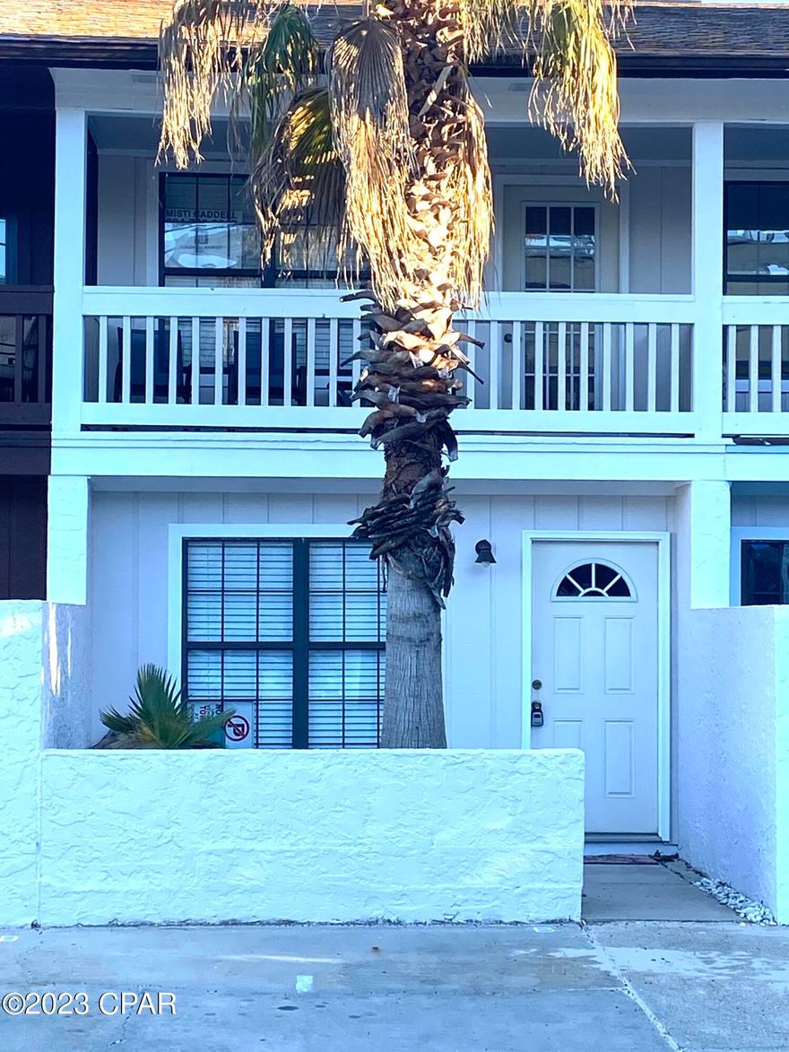 CURRENTLY UNDER CONTRACT, SELLER WILL CONSIDER BACKUP OFFERS NEWEXTERIOR PAINT10/22/22!  GORGEOUS WHITE EXTERIOR -NEW PHOTOS COMING SOON TAKE A LOOK AT THIS BEACH TOWNHOUSE,  JUST STEPS FROM THE SAND AND SCHOONER'S~ LAST LOCAL BEACH CLUB!  IMMACULATE WITH LOTS OF UPDATES!  READY FOR YOUR ENJOYMENT OR A MONEY MAKING MACHINE!  SHORT TERM RENTALS ALLOWED, NO HOA; 1 FULL BEDROOM & BUNK ROOM WITH TWIN BED AND ADDITIONAL TRUNDLE TWIN, UPSTAIRS FEATURES FULL KITCHEN, WASHER & DRYER, COZY LIVING SPACE, FRONT DECK, STORAGE ROOM ON BACK PORCH, PRIVACY FENCE  COMPLETED JUST AFTER LISTING, ROOF 2020, UPDATED BREAKERS & PANEL, NEW LVP IN BEDROOMS, OWNER HAS WIND MIT.  THIS IS A MUST SEE!  CALL TO SCHEDULE PREVIEW TIME!