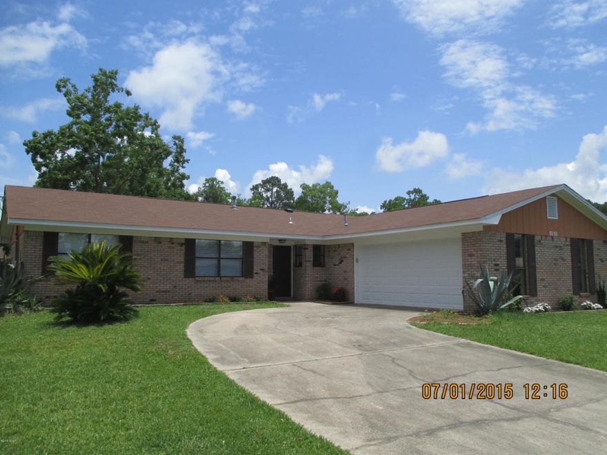MOVE-IN READY! This is a fabulous home in a great neighborhood on a very quiet street and is located practically at the foot of the Dupont bridge and only minutes to Tyndall Air Force Base. The home has been completed remodeled and updated. A large family room with vaulted ceiling and cozy electric fireplace which flows right into the eat-in kitchen. The kitchen has brand new stainless Frigidaire appliances, custom cabinets, counter tops, and breakfast bar. The kitchen has a peek-a-boo window making it feel open to the family room. There is a lot of windows in the home which gives it so much natural light. The bathrooms have been remodeled with new vanities and fixtures. The floor in the home has been replaced with plush carpet and custom tile. The master bedroom