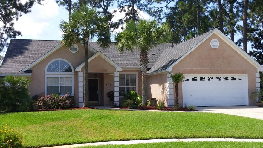 This immaculate home has a great split floor plan in the highly sought after Northshore neighborhood. There are tons of upgrades which include a BRAND NEW roof, beautiful Bamboo wood flooring throughout the living, dining and hallway areas and a new wood burning fireplace with beautiful granite installed on the surrounding sides and the hearth. The master bathroom is updated with new cabinets, ceramic floor tile, double sinks, new faucets and a granite countertop. Two closets are in the master area, including one walk-in. The bright open kitchen has corian counter tops, tile backsplash, ceramic tile floors and a stainless refrigerator and microwave. The breakfast eating area leads out to the backyard to a heated pool, hot tub and kiddie pool. Owners have invested a lot of time in maintaining a beautiful landscaped yard to include flowers, sagos and mature palm trees. Both front side fences have been replaced along with new gates. The backyard is fully fenced and there is a 12' x 8' utility shed for extra storage. The home is located in a quiet cul-de-sac so heavy traffic is not an issue. A provided child fence can be added to the pool area. The home is under a termite bond with Terminix and has a home warranty, both are transferrable. This home has it all and is waiting for a new family!