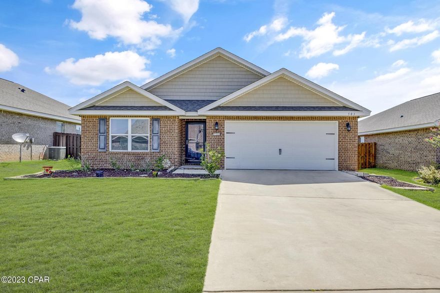 Step into the embrace of an inviting all-brick traditional home, exuding an undeniable allure. Boasting four bedrooms, two baths and an expansive 1,852 square feet of living space, this abode epitomizes charm and comfort. Crossing the threshold, you'll be greeted by a sunlit interior that seamlessly unites the living, dining and kitchen areas, creating an idyllic setting for hosting gatherings. The kitchen is adorned with sleek countertops, stainless steel appliances and abundant storage, a haven for culinary enthusiasts. A sanctuary of relaxation, the primary suite offers a private bath. The remaining three bedrooms embrace versatility, accommodating the needs of a growing family or providing ample space for cultivating a home office. Resting in a serene neighborhood, this residence extends its allure outdoors, where lazy afternoons transform into cherished memories. Immerse yourself in the heart of this neighborhood oasis, a realm where boundless enjoyment and connections await. Redstone Commons offers a meticulously maintained community pool, an invitation to bask on the sun-soaked deck, relish in the warmth or engage in leisurely conversations as kids create joyful ripples in the shallow end. The heartbeat of the community resonates within the welcoming clubhouse, a focal point for events, celebrations and shared experiences. For the youngest residents, the playground is a short stroll away. Designed for first-time home buyers and small families, this enclave finds itself a stone's throw from both elementary and middle schools, providing a seamless connection to education and community. Located south of I-10, Redstone Commons is a testament to living well.