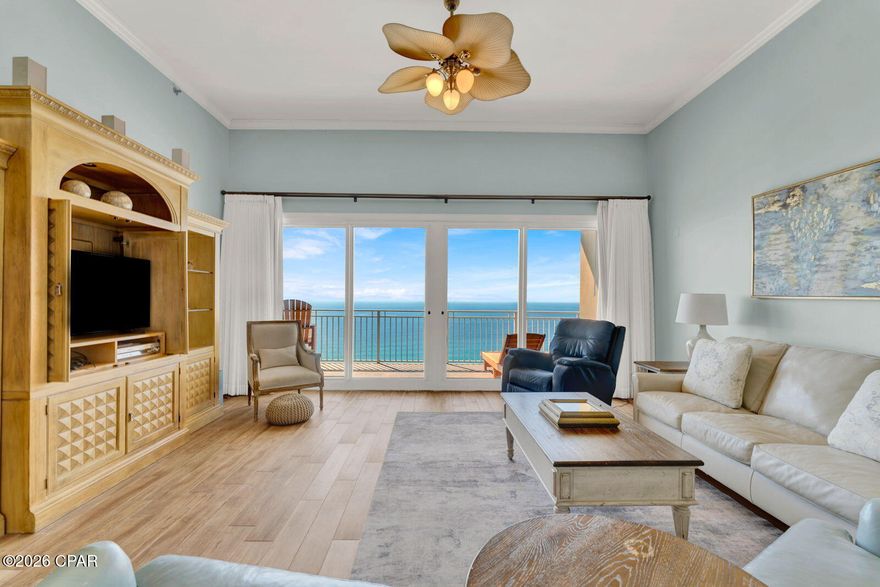 Experience coastal luxury in this stunning 2-bedroom, 2-bath top-floor ''Captiva'' Executive Penthouse resort condominium at Sterling Beach Condominium in Panama City Beach. Built in 2003 and lovingly maintained by a single owner, this exceptional residence showcases pride of ownership and thoughtful updates throughout. Recently updated within the past two years, the unit features fresh interior paint, new furniture, updated drapes, and new stainless-steel appliances, creating a modern, move-in-ready coastal retreat. Soaring 10- to 12-foot ceilings enhance the open floor plan, giving the space a bright, airy, and expansive feel. Enjoy breathtaking, unobstructed views of the Gulf of Mexico from the oversized balcony that spans the entire length of the unit, perfect for relaxing, entertaining, and taking in unforgettable sunsets. The primary bedroom also offers direct balcony access and stunning water views.  The luxurious primary suite includes a large walk-in closet, dual vanities, a jetted soaking tub, and a separate walk-in shower. The spacious kitchen is beautifully appointed with granite countertops and ample workspace, ideal for everyday living or hosting guests.  Immaculately maintained and exceptionally clean, this executive penthouse offers the perfect blend of comfort, elegance, and beachfront living. Whether you're seeking a primary residence, vacation home, or investment opportunity, this is a rare chance to own a premier Gulf-front retreat.