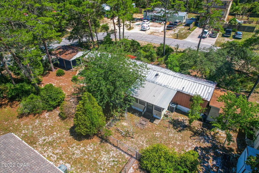 Nice double lot with mobile home that is priced to sell.

Mobile home has a recently replaced hvac system and has a metal roof.

property can be short term rental.

Sold As-is.

Quick to Pier Park and West to 30A Area.