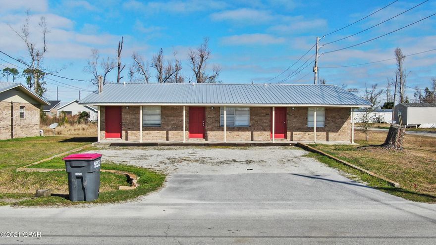 CURRENTLY UNDER CONTRACT, SELLER ACCEPTING BACKUP OFFERS - TRIPLEX FOR SALE! Each unit has 1 bedroom, 1 full bath and an open living/kitchen concept. Every unit has its own water meter and electric meter and each tenant pays for all their utilities and $700 per month in rent. The exterior is brick with a newer metal roof and has a covered front porch and 4 parking spaces up front. The lot size is 75x185.5 (per survey) and has already been surveyed to split the lots if so desired (Ask your Realtor for a copy of the survey).  Additional Triplex for sale next door (units A, B, & C). Call today for your own private preview.