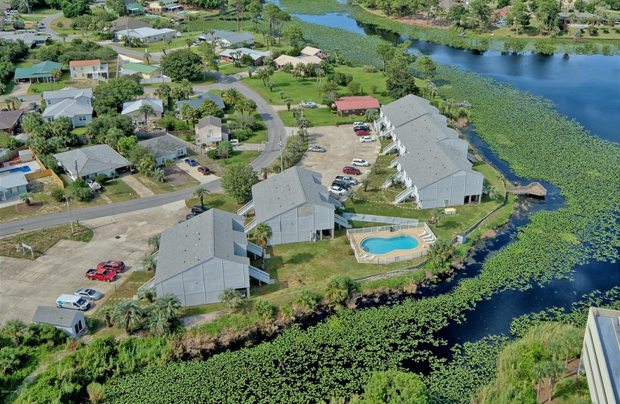 AMAZING 2BR/2BA NOW AVAILABLE FOR SALE AT LULLWATER CONDOS! Waterfront Condo just across the street from America's Most Beautiful Beaches! You have to see this one to believe it! Recent Updates include New Plank Flooring, New Complete HVAC System!, YOU SAVE $4000k! Wow! New Water Heater, New Dishwasher, New Kitchen Backsplash, and Refrigerator is less than 2yrs old !! Lullwater Condominiums is located less than a mile from the famed Pier Park Center & Fishing Pier!! Watch the 4th Of July or New Years Fireworks from your balcony overlooking the beautiful Coastal Lullwater Lake. Close to everything else, you can't just beat the VALUE of these Condominiums for Investment or for a Vacation Home! All for UNDER $200K!! Brilliant!! Sold A