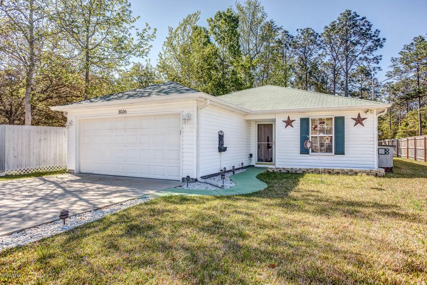 NO detail left to chance!  This three bedroom house features Good Cents Select features, vinyl exterior, enclosed porch, covered deck, upgraded lighting package, step up ceiling, separate laundry room, walk in closet, sodded yard with sprinkler system, separate yard well for irrigation, three storage buildings, two car garage, and security system. These are features which will make you want this house to be your home.  Home is centrally located with the convenience of shopping, schools and restaurants just minutes away.  Additional photos will be added once furnishings have been removed from house.  100% financing is available for qualified buyers.  All information contained herein in intended to be correct however buyer assumes complete responsibility for verification of all information.