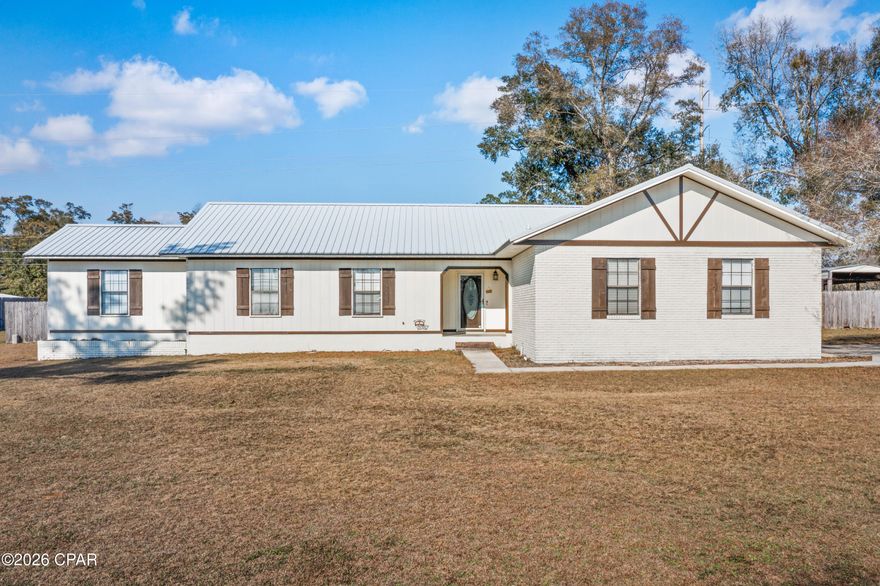 Welcome to 5227 Woodgate Way. This 1,972 sq ft home is located on Indian Springs Golf course located and in Indian Springs Subdivision. This 4 Bedroom 2 1/2 Bath Light Bright and Airy home with an Open floorplan  makes it the perfect home for your growing family or extra room for the grand kids! Cozy up in front of the fireplace on these cold winter nights or enjoy a movie night with the kids! The Large Living Room boasts vaulted ceilings, wood floors and is open to the dining area and kitchen and all overlook the spacious backyard which is fully fenced and a perfect place for the kids to play. The kitchen has a center moveable island and plenty of room for entertaining and an abundance of cabinet space. The Master Bedroom has a nice dressing area with a private bathing room. There is a separate Laundry room plus an attached 2 car garage. Don't forget the storage building with cover to park your boat and to store all your outdoor equipment! All of this sitting on 1.08 acres!! Call today for your personal showing before this home is gone!!!