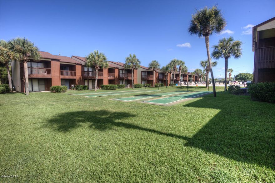 CURRENTLY UNDER CONTRACT, SELLER ACCEPTING BACKUP OFFERS' This is a great location , the unit backs up to a wooded preserve like area that is private and pristine. Located close to the dedicated boardwalk which takes you to the beach access. Beachwalk offers beautiful landscaped grounds, tennis courts, shuffleboard, community room and shared in ground pool. This is a 2 bedroom 2 bath unit unlike any unit in the community with the redesigned open floor plan. The 1st floor offers full bath with shower, nice open kitchen with granite counter tops and island breakfast bar, dining area and nice size livingroom with access to the private covered patio with storage closet.

2nd floor - 2 bedrooms and full bath, master bedroom has private balcony with additional storage closet, washer/dryer also l