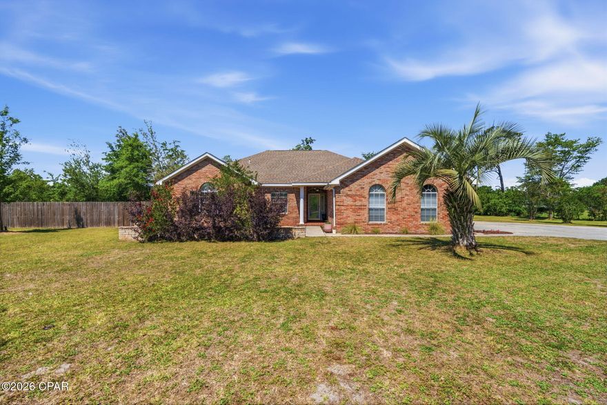 Tucked away on just under 2 acres in the highly sought-after Kingswood area, this all-brick home offers the perfect blend of country living with the convenience of being just minutes from town. Featuring 3 bedrooms, 2 beautifully remodeled bathrooms, PLUS a formal office, attached 2 car garage, and detached garage/wokshop! Step inside to find a warm and inviting living room highlighted by a cozy fireplace and cathedral ceiling, while durable LVP flooring flows throughout all main living areas. The spacious kitchen is equipped with stainless steel appliances and plenty of room for gathering and entertaining. The primary suite features a tray ceiling, large walk-in closet, and a remodeled en suite complete with a tiled shower with glass doors and elegant tile surround above the soaking tub. Enjoy year-round relaxation in the oversized sunroom overlooking the peaceful property. Outside, the amenities continue with a chicken coop, and an impressive drive-through detached garage/workshop perfect for hobbies, storage, boats, or extra vehicles. If you've been searching for room to spread out without sacrificing convenience, this Kingswood gem is a must-see!