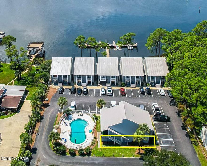 CURRENTLY UNDER CONTRACT SELLER WILL CONSIDER BACK UP OFFERS. INCREDIBLE Opportunity to Live in this WATERFRONT Community with BOAT SLIP Access! Rare opportunity to own a beautifully renovated 1 bedroom 1 bath in a gated waterfront community with access to a boat slip on Grand Lagoon with easy access to the Gulf close by. Boat slips are available to residents on a first come basis here at this Small Condo community called Dockside North. Located at the East end of Panama City Beach.  Ground floor with lots of light coming in thru sliding doors. Comes with a designated parking in front of the unit and a beautiful pool area directly behind the unit.  The entire pool area is being resurfaced including the pool patio and the assessment was just paid. Dogs are allowed but must be on leashes in common area.