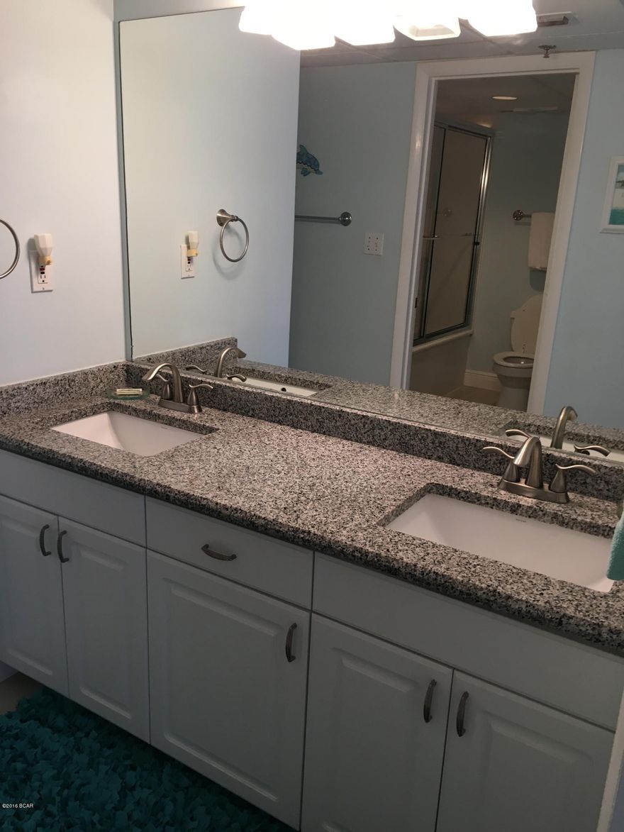 Highly sought after one bedroom condo at historical Long Beach Resort.  This condo conveys fully furnished and is turn-key ready for the start of the peak rental season.  Kitchen and Baths both feature renovations. Tile floor throughout including the spacious balcony which fronts the entire length of the condo.  The floor to ceiling windows really capture the gorgeous views of the sugar white sand beach and gulf of mexico. This is a low density building with only 6 units per floor.  Long Beach Resort is home to The Hangout Bar & Grill, four pools including the tropical lagoon pool with waterfall, whirlpool spas, gym, security guard gated entrance.  This unit won't last long on the market; call today to see.