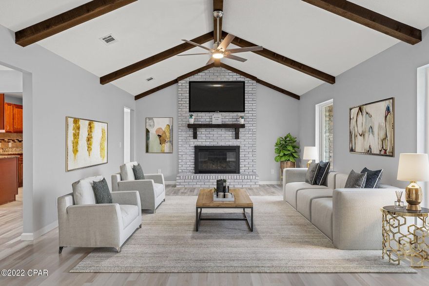 Here is your chance to own a beautifully remodeled home on a quiet cul-de-sac. The property is only about a 10-minute drive from Tyndall AFB and would make a great family home. Enjoy the amazing craftsmanship with wooden exposed beams in the living room and floor to ceiling fireplace. There is also a huge workshop in the back yard that is insulated and conditioned. The home has new LVP flooring, lighting, windows, trim and more. You won't want to miss your chance at this one!