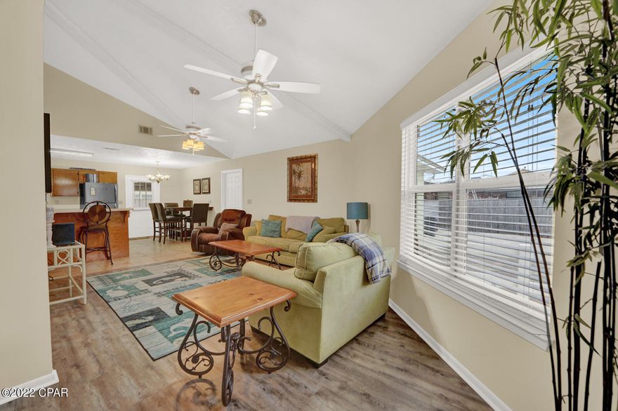 AMAZING LOCATION! Just a few mins to the beach by golf cart. Short Term rentals allowed! Corner lot. Perfect location. Metal roof, LVP throughout. Fully furnished and rental turnkey ready! 2 Bedrooms, with loft and additional room for another place for a bed. Kitchen features wood cabinets, and newer appliances. Tastefully decorated! The outside of this home is amazing! Hugh corner lot with plenty of space for entertaining. Covered tin roof area for watching the game outside! Owner is in process of finishing a small splash pool, will be ready by closing. Just needs to be plastered and pump hooked up. Needs nothing to be a great turn-key rental. All sizes are approx. and should be verified if important.