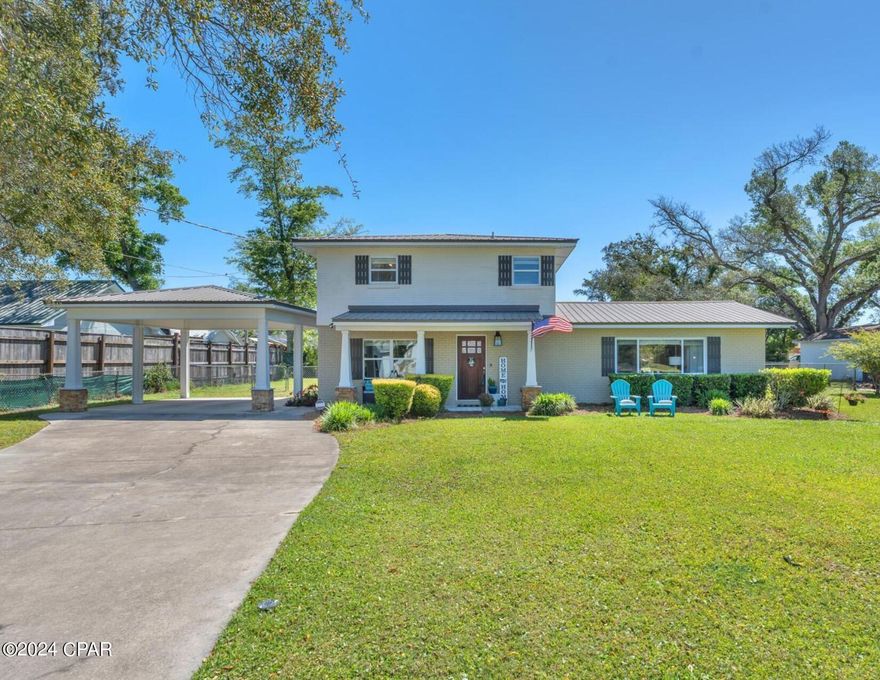 **LOCATION, LOCATION, LOCATION**
-Motivated seller, willing to entertain any reasonable offers! This turnkey home presents an exceptional opportunity for those seeking a residence in a prime location. Situated conveniently in town and mere minutes away from the picturesque Panama City Beach, two local college campuses, and just minutes away from local shopping and grocery stores. This property boasts a prime location. Featuring four bedrooms, two and a half baths, and an office/den that could serve as a fifth bedroom with a closet, this two-story home underwent a comprehensive renovation in 2014. Upon entering, the open layout offers a welcoming ambiance, accentuated by the living room's vaulted ceiling that bathes the space in natural light.

Noteworthy upgrades implemented in 2014 comprise a 14 SEER HVAC system, a new metal roof, spray foam insulation, complete replacement of electrical wiring and plumbing, and a newly installed driveway. Recent enhancements within the past year include updated light and fan fixtures, cabinetry hardware, and luxury vinyl plank flooring in the master bedroom. The property showcases premium finishes such as granite countertops, a Samsung stainless steel appliance ensemble, hardwood flooring, tile features, and upscale bathroom and lighting fixtures. The exterior features a gorgeously landscaped yard, and a detached (17'x20') shed/workshop with power. This impeccably renovated home is primed for a new family to enjoy its splendor. Schedule you're viewing today to witness this remarkable property firsthand. A viewing is highly recommended!