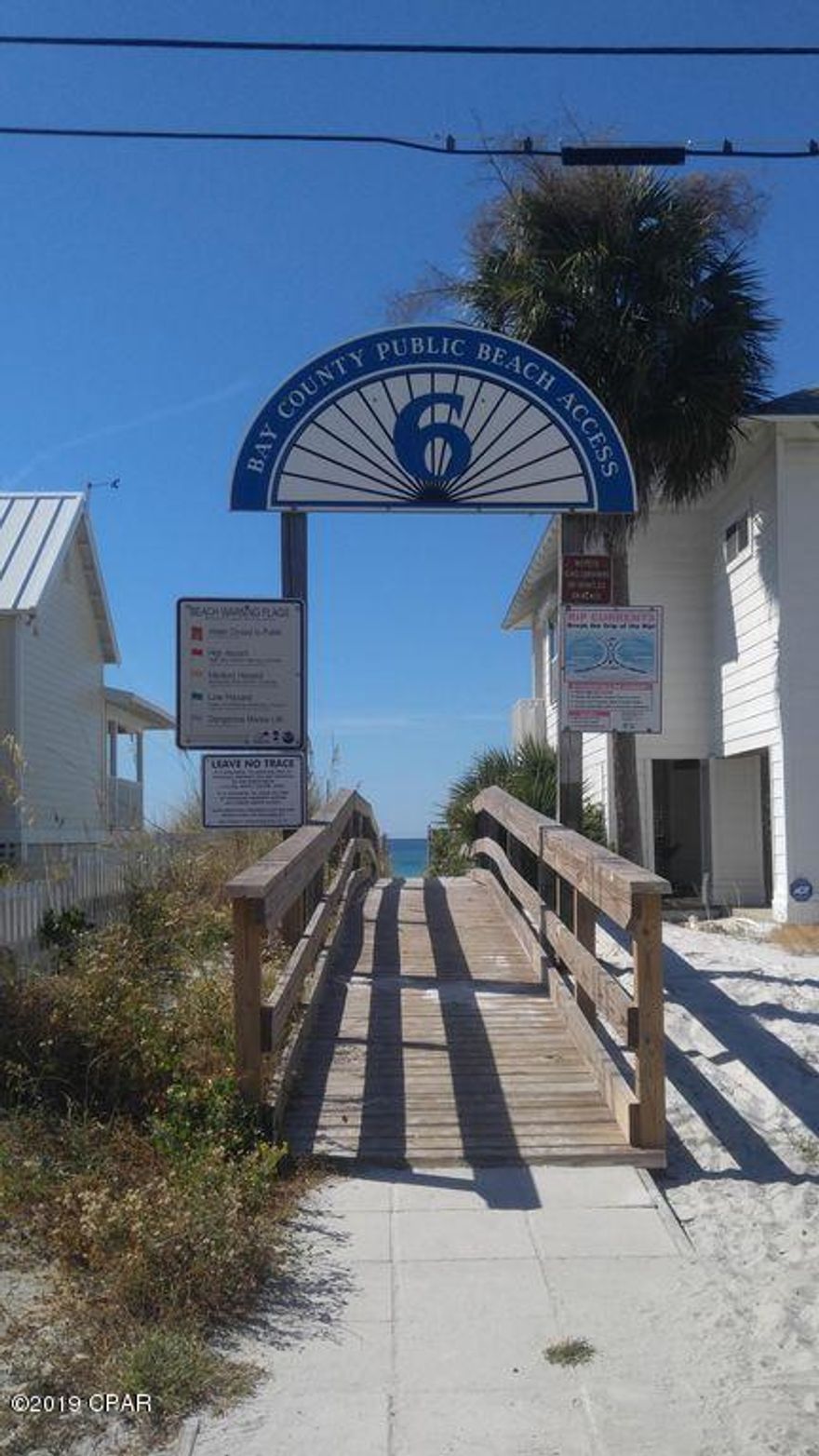 Steps from the beach! Fully furnished ground floor unit in quiet resort across from beach access. Condo has washer/dryer/ microwave, and TV's.  Only 2 blocks to Schooners with parking right in front of unit.