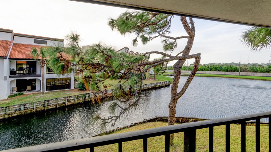 CURRENTLY UNDER CONTRACT, SELLER ACCEPTING BACKUP OFFERS. Resort Beach Home at Edgewater Resort Golf Villas located in Panama City Beach, FL.  Edgewater Resort has everything you will want and need at a Beach Resort! 2nd floor, Corner Unit!  Love to Golf?  Edgewater features a 9 hole Executive Golf Course, UNLIMITED Free Golf for Owners!  Enjoy this Upgraded, Split floor plan, 2 bedroom, 2 bath Condo, located on the 2nd floor with soothing water views from the Master and the LR.  Upgraded Kitchen with Granite and stainless steel appliances. Wainscoting in the hall, carpet and tile throughout the unit.  With your condo on the 2nd floor, you will a quieter relaxing experience. Edgewater Resort offers Oceans Restaurant and Bar, poolside with views of the Gulf, Shopping, Lighted Tennis Courts, Hot Tub, Lagoon Style Pool, Basketball, Shuffleboard, Pizza, Market, Kids Club with Splash Pad, Security guards,  Gated 24 hr. Community, Activities, 11 pools, Tram shuttle to get you anywhere in the Resort, Private walking/tram bridge walking with access to the Beach and much more!  Unit comes furnished with the exception of a few personal items not conveying.  Pets OK for owners.