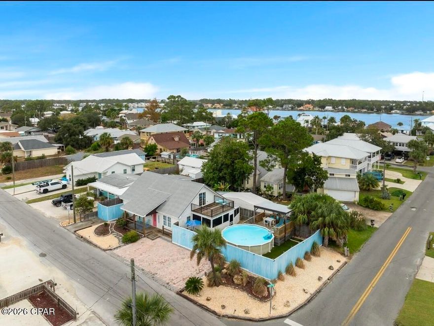 Experience a turnkey, income-producing coastal investment in the highly sought-after Biltmore Beach community of Panama City Beach's South Lagoon. Whether you're looking for a high-performing short-term rental, second home that pays for itself, or a flexible beachside asset, this property checks every box.

Located just four blocks from the sugar-white sands of the Gulf and minutes from Grand Lagoon boat ramps and St. Andrews State Park, this home sits in one of PCB's most consistently booked, investor-friendly pockets—close to dining, shopping, and year-round attractions that drive strong occupancy.

The thoughtfully designed layout maximizes sleeping capacity and rental appeal, featuring three bedrooms, two full bathrooms, and a spacious upstairs bonus room—perfect for additional sleeping quarters or a second living space. An upper-level balcony overlooks the private backyard retreat and pool, adding another highly desirable amenity for guests.

Recent upgrades enhance both guest experience and long-term durability, including remodeled bathrooms and a modern kitchen with granite countertops and stainless steel appliances. Outside, the fully fenced backyard is a true revenue driver with a private pool, covered deck, tiki-style seating area, artificial turf for low maintenance, and a screened porch with hot tub—exactly the amenities today's vacation renters search for.

The home is offered fully furnished with coastal décor and comfortably sleeps up to 12 guests, allowing a new owner to step in and start generating income immediately. Additional highlights include covered parking plus space for multiple vehicles, a major advantage for larger groups.

📈 Strong location. Proven layout. High-demand amenities.
This is a rare opportunity to acquire a turnkey short-term rental with excellent cash-flow potential in one of Panama City Beach's most established vacation rental corridors.