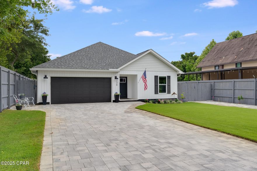 Just 0.4 miles to the beach!
This beautifully built 2021 single-family home in the sought-after West End of Panama City Beach offers 3 bedrooms, 2 bathrooms, and a heated saltwater pool. With 1,504 sq ft of living space on a 0.15-acre lot, this home is perfect as a primary residence, vacation getaway, or investment property.

Inside, you'll find an open-concept layout featuring tile plank flooring throughout, granite countertops, and a smart home system. The contemporary kitchen flows seamlessly into the dining and living areas, creating an ideal space for entertaining.

The split floor plan places the primary suite off the living room, complete with a walk-in closet and en-suite bathroom featuring double vanities. Two additional bedrooms are located at the front of the home and share a second full bathroom—perfect for guests or a home office.

Step outside to your private backyard oasis, highlighted by a heated saltwater pool and privacy fence. A beautiful paver driveway surrounded by lush zoyza grass offers ample parking, while the garage provides added storage for vehicles, beach gear, or a golf cart.

No HOA and short-term rentals allowed—this home truly checks all the boxes!

Located just minutes from Panama City Beach's top attractions, including Pier Park—a vibrant hub for shopping and dining—this home also offers convenient access to 30A Avenue and the charming community of Rosemary Beach. Nearby Frank Brown Park features sports fields, walking trails, and year-round community events. Best of all, you're just a few easy blocks from the stunning white sand beaches of the Gulf of America. Coming attractions: Top Golf, Dolly Parton Pirate Show and Shell Point Surf Park. Buyer to verify all information for accuracy.