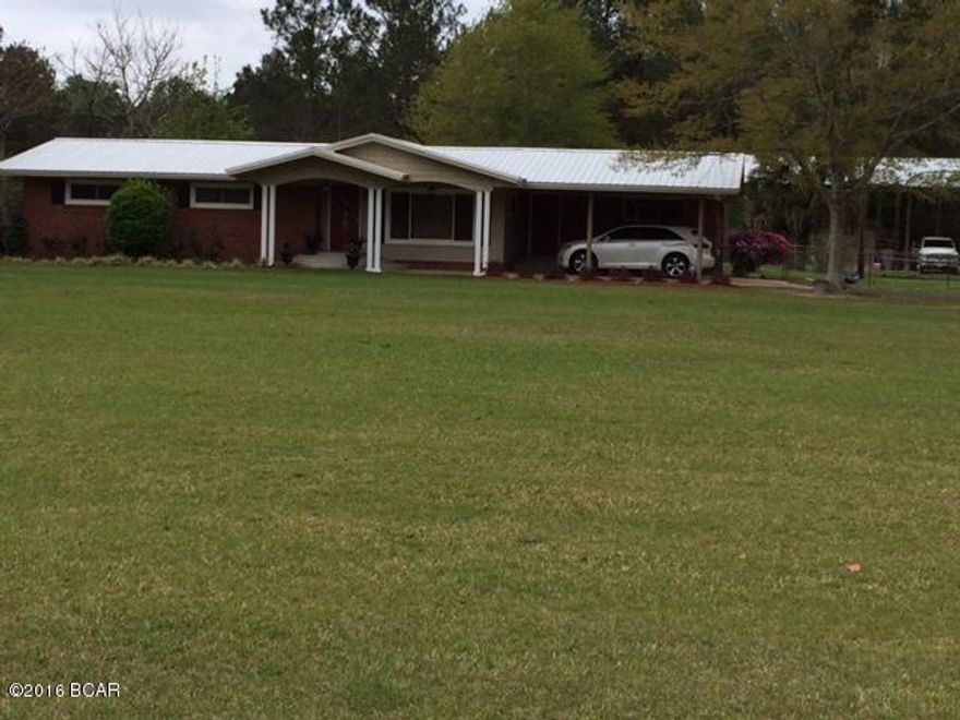 Don't let the age of home fool you.... beautiful home with lots of updates. Great location on with lots of paved road frontage. Ranch brick home boosts 4 bedrooms 2 bath (4th bed currently being used as den) updates throughout with new windows, roof, well, AC, porch, floors, electric, plumbing when bathrooms updated, extra insulation are just a few things. Property has great curb appeal nestled in between privacy of pines on both sides with 2 ponds. Sprinkler system flowers beds and trees in front. Property also includes 20x40 inground salt pool, diving board and slide. Steps away from covered patio area all fenced in. 32x60 pole barn with electric and water over 14 ft high for RV covering. Inside original hardwood floors have been refinished along with kitchen cabinets. Dining room has ventless  gas fireplace and recessed lighting. Wait till you see the main bath with walk thru tile shower. Won't last long!!!!