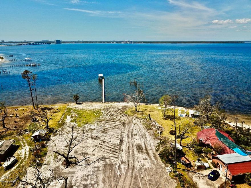 WOW! 50 feet of bay front with seawall! This property is 300 feet deep with plenty of room for large home, pool and green space. bayfront yard facing the west for the best sunsets in the world. Just a quick boat ride to shell island! House plans are available for this site.