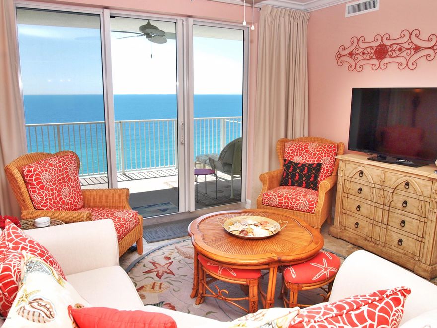 This Tropic Winds condominium is absolutely gorgeous with spectacular upgrades throughout, no expense has been spared. This unit is nicely decorated and is being sold with all upscale furnishings and upgraded fixtures. Beautiful diagonal tile, with dimensional baseboard molding, is located through out each room. Rich upgraded granite countertops, with beveled edge, have been installed in the kitchen and each bath. Matching tiled back facing is installed under the kitchen bar. Custom tile accent pieces originated from south Florida. The kitchen includes stainless appliances including a side-by-side refrigerator, elegant kitchen counter lighting, large undermount sink, upgraded facet, custom matching backsplash, and upgraded cabinet door handles. Custom wall-to-wall curtains are included. The living room and master bedroom include balcony access and have majestic gulf views. The bedrooms are tiled and include wide bifold closet doors to maximize use of the closet space. The bathroom includes elegant vessel sinks with waterfall facets. The shower/bath walls have a beautiful
custom tile design with dividing tile accent strip. The laundry room has front-loading Whirlpool washer and dryer with cabinet storage. The spacious 10x28 balcony includes upscale furnishings and outdoor ceiling fans. Tropic Winds is well known for its oversized balconies that are large enough to accommodate patio tables and chairs, loungers, and still have plenty of room remaining. The development is located on the west-end of Panama City Beach and is close to Pier Park and the new Northwest Florida Beaches International Airport. The condo is being sold with all furnishings, accessories, and decor. All measurements, dimensions, square footage, to be verified by buyer.