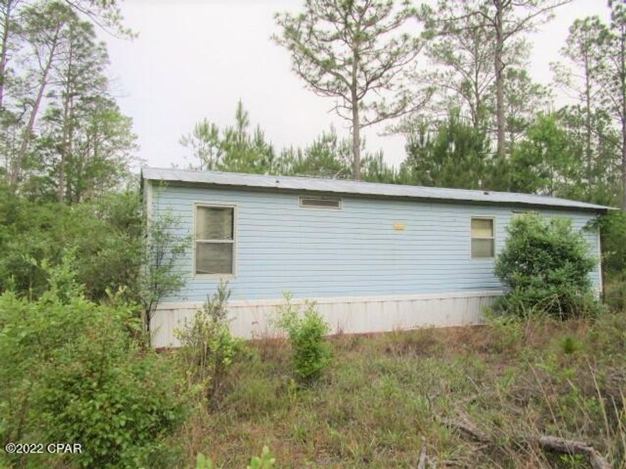 CURRENTLY UNDER CONTRACT, SELLER ACCEPTING BACKUP OFFERS.  Great camp get away in the national forest for under $50k.  If you want to be close to hunting you cannot get a better spot than this.  This home sits on a large 1 acre lot that give you plenty of room for all your toys.  If you have always wanted a place in the national forest this is it.