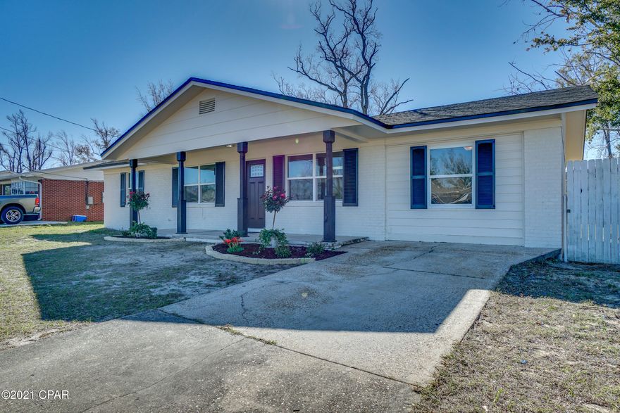Come see this beautifully renovated home in desirable Lynn Haven area within walking distance to Mowat Middle School. Walk in the front door to an open living room and kitchen.  Upgrades include new roof, custom bath tile, new AC, carpet, all wood cabinets with soft close, quartz countertops and large eat-in kitchen island.  4th bedroom could be used as a playroom, office, or hobby room. Fully fenced backyard with ample area for play or entertaining.  Don't pass up this fantastic home.  Call a Realtor today to make an appointment to see this home in person!